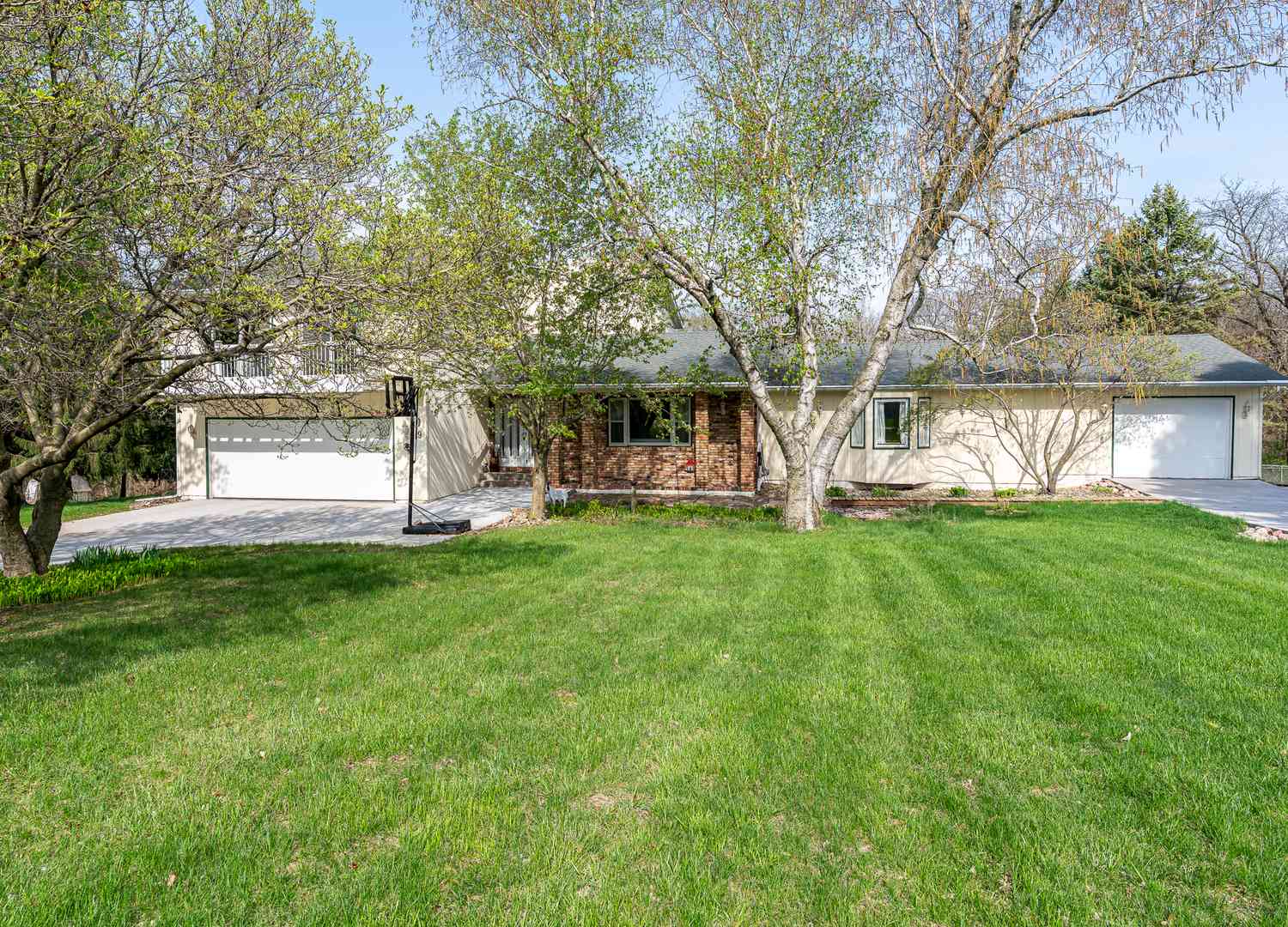 Homes For Sale - 9 Valley View Drive<br/> Blue Grass, IA 52726